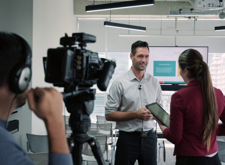 man-is-standing-camera-with-microphone (1)