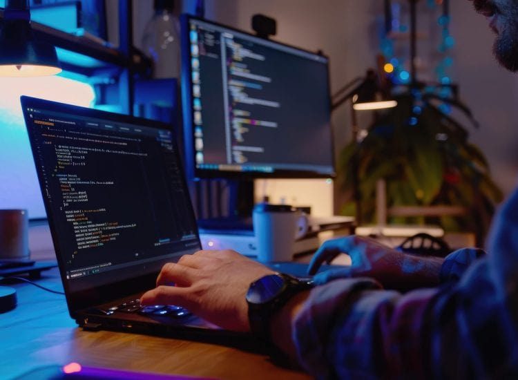 programmer-working-computer-dark-room-programmer-coding-code-desktop-computer-scaled-rayuzumbb9kg4nmjc2i5tudal62bb5r20rygjuc4qk-min-min